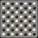 Kōnane board of black and white stones